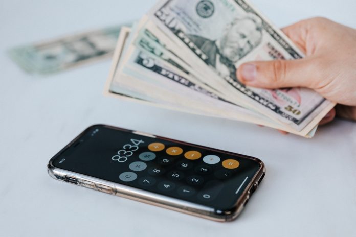 pexels-karolina-grabowska-4386292 Pay off debt with these money saving hacks.